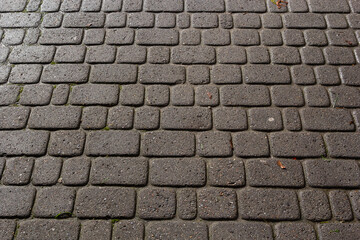 Cobblestone road. Gray cobblestone texture, vintage road surface