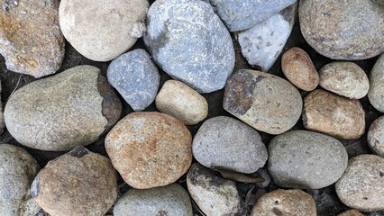 round stone gravel texture for background, natural pebble texture