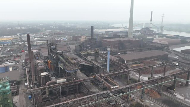 Blast furnice and industrial recycling company. Sintering, zinc production, furnace and casting. Steel industry factory plant. Aerial drone overhead view. Heavy industry in Germany.
