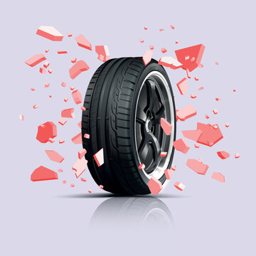 A wheel with a cast disk among stone fragments. Wall explosion. Sports car wheel tread. Tyre wheel rubber. © Strajinsky