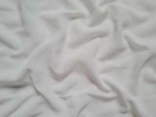 Fototapeta premium The white fabric wrinkled to look beautiful. Make the surface look strange and beautiful.
