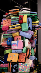 stack of colorful laggage