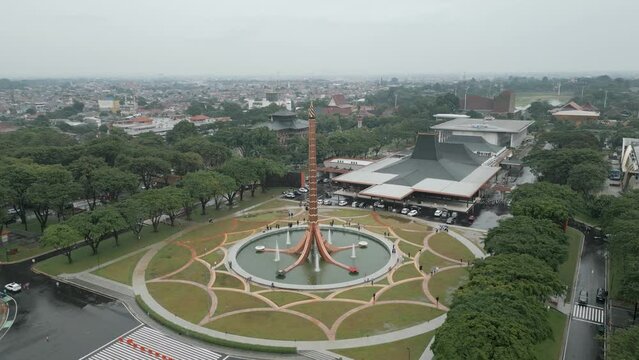 Jakarta, Indonesia - December 25, 2022: The Pancasila Fire Monument (Tugu Api Pancasila) is a TMII land mark, just like Monas is a Jakarta landmark.