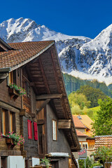 Fototapeta na wymiar Old traditional wooden house in Swiss Alps