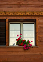 Fototapeta na wymiar Old traditional window in village in Swiss