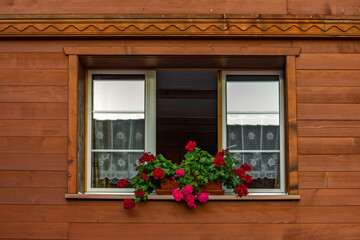 Fototapeta na wymiar Old traditional window in village in Swiss
