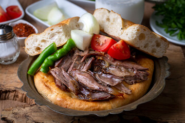 Delicious meat dish from Turkish cuisine; Konya oven kebab, tandoori kebab. Turkish name; Konya furun or firin kebabi, tandir kebabi