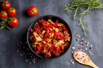 Traditional, delicious Turkish appetizers; Dried tomato appetizer salad with walnuts (Turkish name; Kurutulmus domates mezesi salatasi)