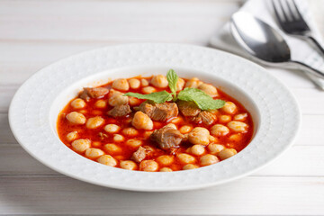 Traditional delicious Turkish foods; Turkish Food Chickpeas with Meat. Turkish name; Etli nohut