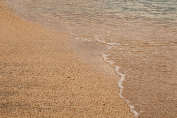 sand and water on the beach