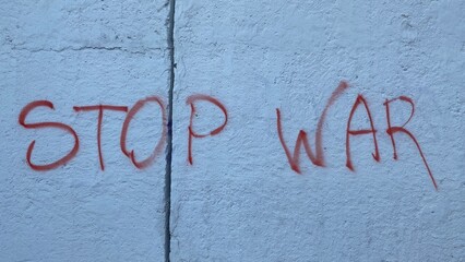 The inscription stop the war on the wall. Stop war in Ukraine.
