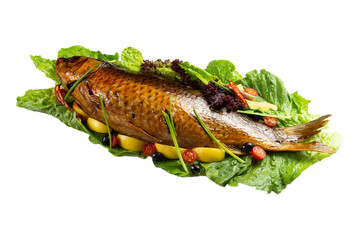 Cooked carp on lettuce leaves. 
transparent