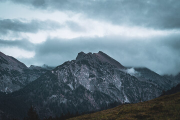 Scenic mountain view under a cloudy dramatic sky