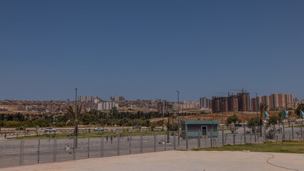 Fototapeta na wymiar Panorama of the city of Oran in Algeria looking from one of the athletic stadiums over the fence.