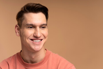 Fototapeta premium Portrait of happy successful caucasian man standing, looking with positive smile