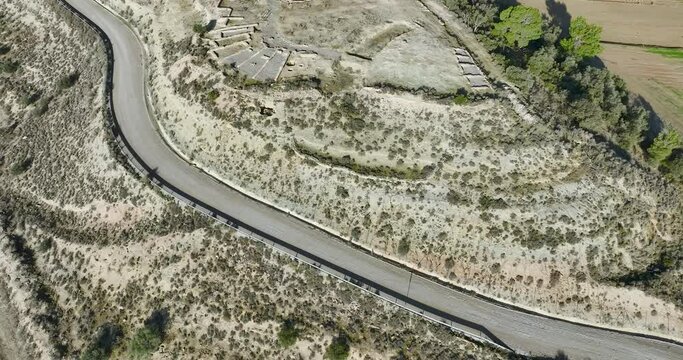 Iberian site of the Estinclells, 3rd century BC, in Verdu. Formed by defensive elements, a moat and a wall, a battery of houses and a raft arranged around a cobbled street. aerial view Cenit