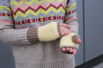 Woman in beige woolen oversize sweater