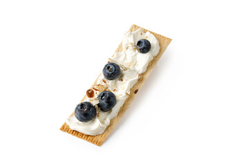 Sandwich, toast on grain crispbread with cream cheese, blueberry and nuts isolated on white...