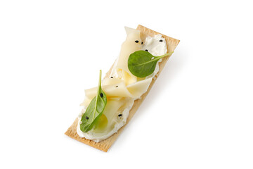 Sandwich, toast on grain crispbread with cream cheese, sliced cheese, spinach isolated on white...