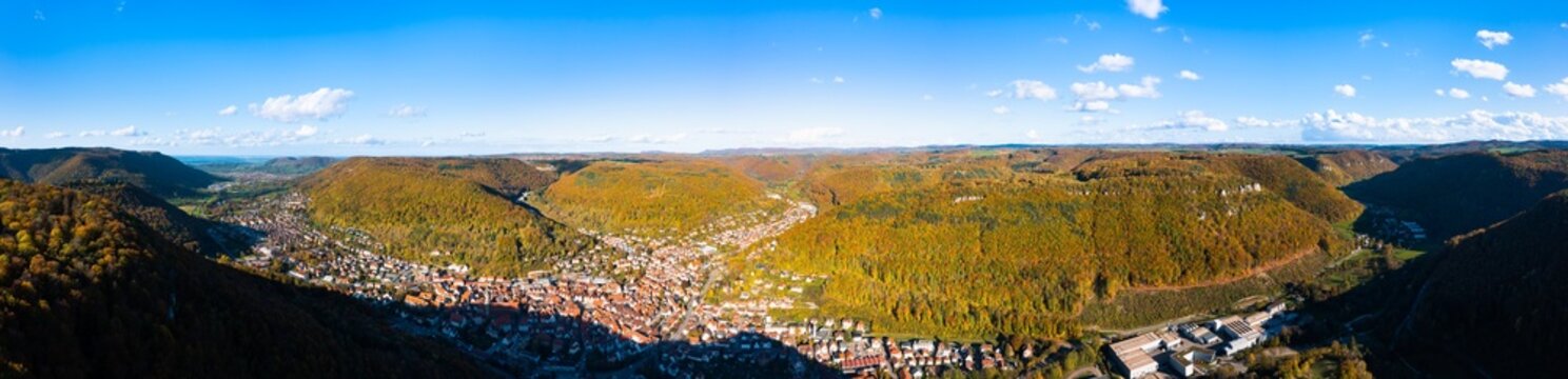 Aerial view of Bad Urach in front of mountain landscape of Swabian Alb