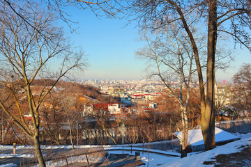 Fototapeta na wymiar Winter Kyiv cityscape panorama of Podil, Ukraine 