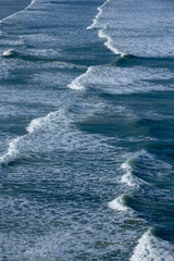 Waves hitting the beach on coast of Brazil
