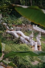 tourist girl at buddhist temple Wat Pha Lat in Chiang Mai, Thailand.
