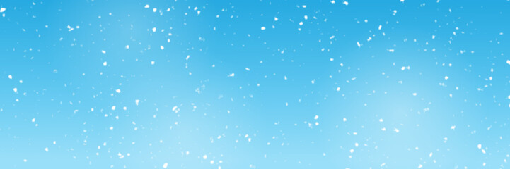 Fototapeta premium Snowfall texture of snowflakes on blurry background design weather winter sky. blue snowfall bokeh background, the snowfall in the evening