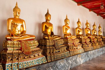golden buddha statue in temple of thailand