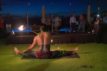 fire show, dancing with flame, male master fakir with fire works, performance outdoors.