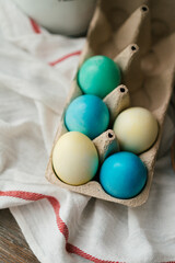 Easter eggs colored in Ukrainian style like Ukrainian flag yellow and blue colors. Easter symbols top view