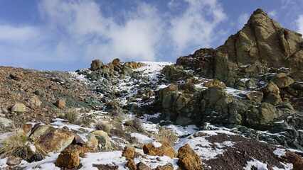 Teide National Park after snow on a winter day, volcanic mountains covered with a bit of snow, Tenerife, Canary Islands, Spain 