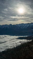 fog revealing mountain, Ligurian Alps, Piedmont region, Province of Cuneo, north-western Italy,...