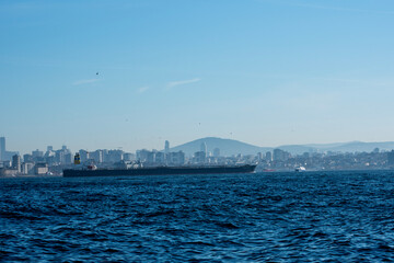 The ship sails through the Bosphorus in the morning