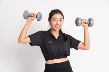 close up of beautiful woman lifting dumbbells exercising shoulder muscles on white background