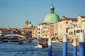 Fototapeta na wymiar View of Venice. Gondolas sailing on a canal in Venice. Venice city. 