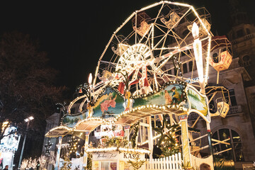 The Old City of Bremen during the holidays season, Christmas market in Bremen, Die Sögestrasse, street of Bremen with light reflexion after the rain, people in Xmas Market