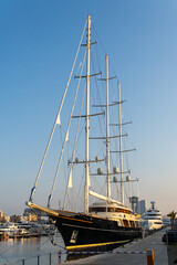 Fototapeta premium Large sail boat moored at the harbour in Barcelona in Februari