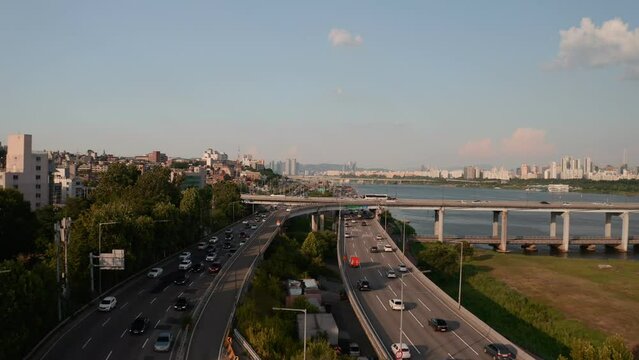 [korea drone footage] Han river city landscape, Seoul, road, sunset