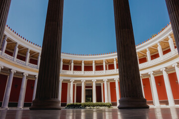 White columns on circle garden inside historic greek theatre