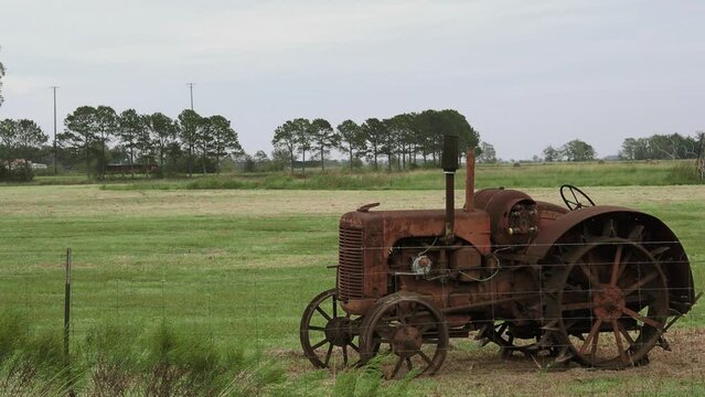 Rusty old tractor in a field