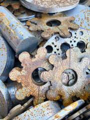 Steel cog shapes rusted and ready for recycling