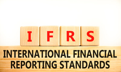 IFRS symbol. Concept words IFRS international financial reporting standards on block on beautiful white background. Business IFRS international financial reporting standards concept. Copy space.