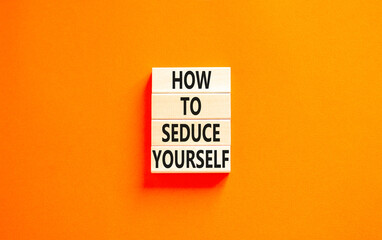 How to seduce yourself symbol. Concept word How to seduce yourself on wooden blocks. Beautiful orange table orange background. Business and how to seduce yourself concept. Copy space.