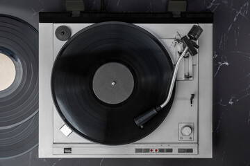 Turntable Vinyl records, party music, top view. Empty copy space for record label mockup. Vintage retro sound recording style. Background for the design of a poster, postcard, flyer for music events