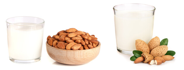 Almond milk in a glass and almonds in a wooden bowl isolated on a white background