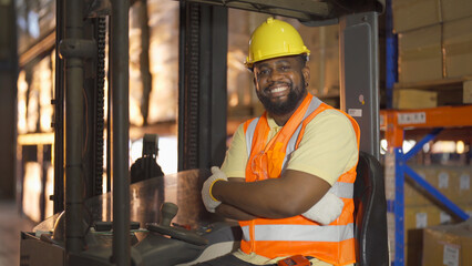 Portrait of black man worker working in large warehouse retail store industry factory. Rack of stock storage. Cargo in ecommerce and logistic concept. Depot. People lifestyle. Shipment service.