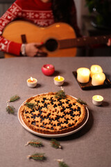 selective focus on christmas tart with pastry stars decoration