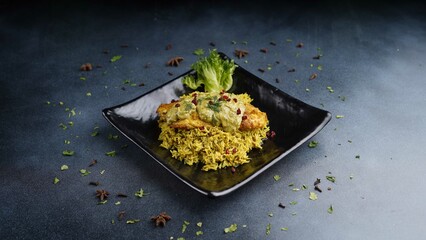Fish fillet in tamarind sauce serve with dill rice and special salsa served in dish isolated on table top view of arabic food
