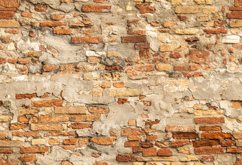 Brick wall seamless texture with rough stones